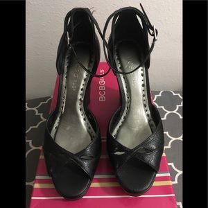 BCBGirls Black peep toe wedge.